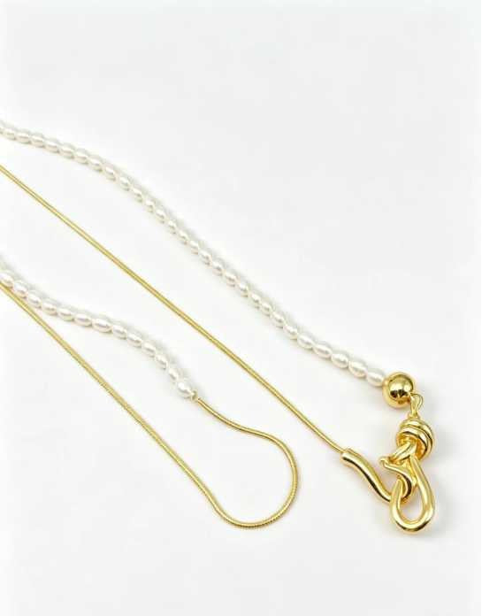 Natural seed pearls and snake chain detail